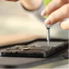 32 db-os precíziós GSM csavarhúzó készlet mágneses bitekkel